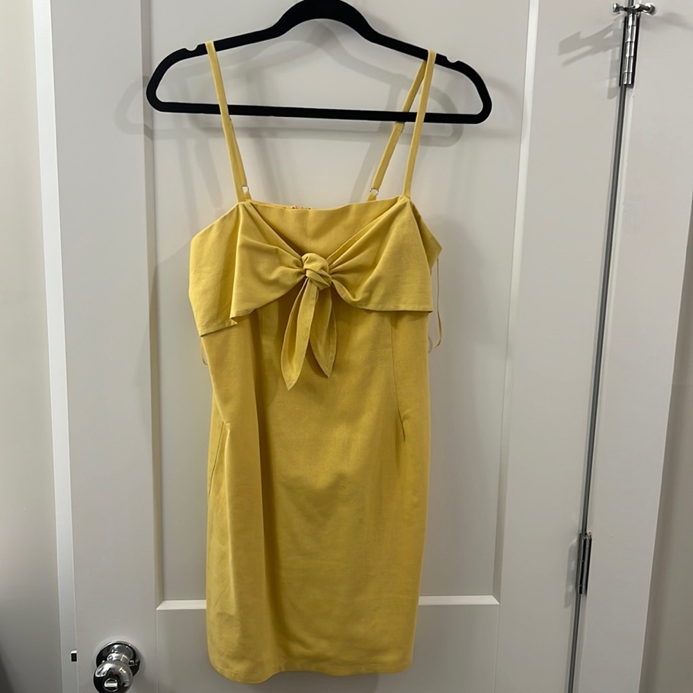 Yellow sundress with bow detail